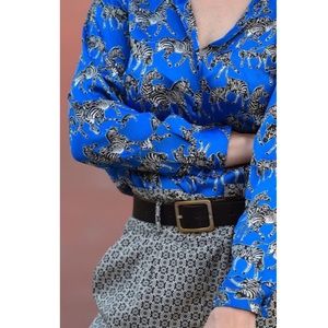 green patterned blouse